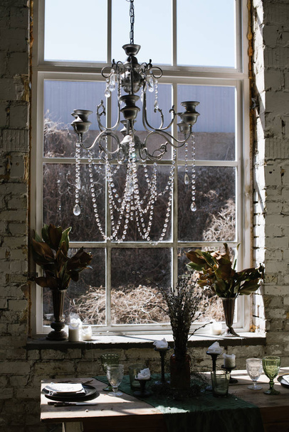 Vintage chandelier in the background of the window - Фото, изображение