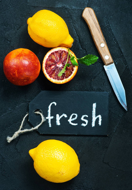  fruits on a table and word fresh  - Foto, afbeelding