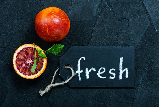 citrus fruit on a table and word fresh  - Fotoğraf, Görsel