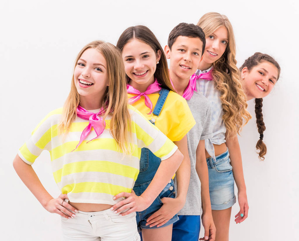 cute teenage children standing one by one - Photo, Image