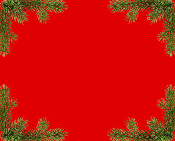 Red christmas frame from fir branches - Foto, afbeelding
