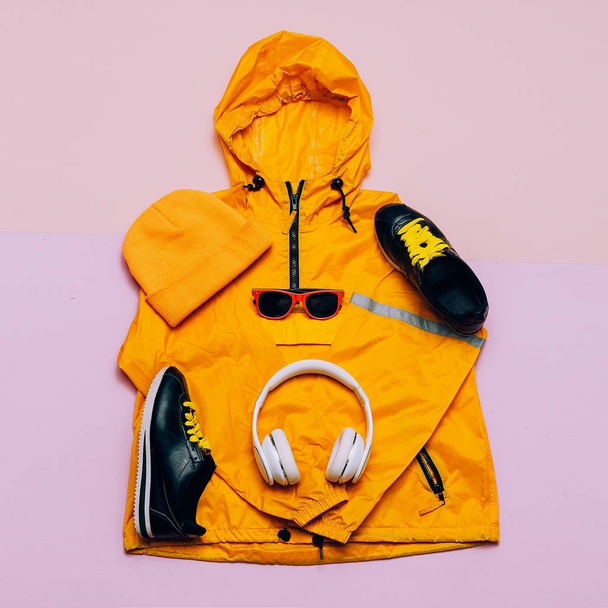 Cloak, Keds and Headphones Hi Rain Season. Urban street fashion. - Фото, зображення