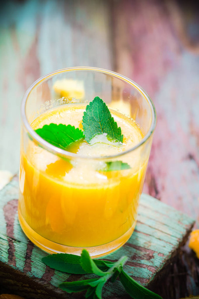 Juice from fresh oranges leaves stevia - 写真・画像