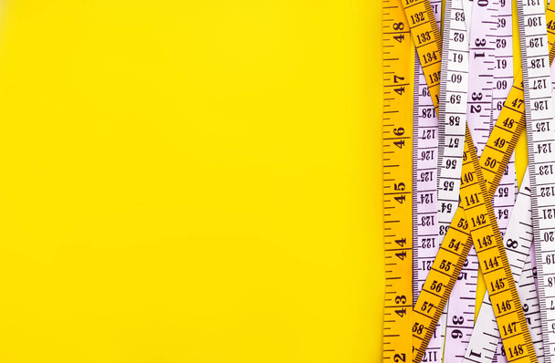 Diet control concept background. Colorful of Measuring tape  - Photo, Image