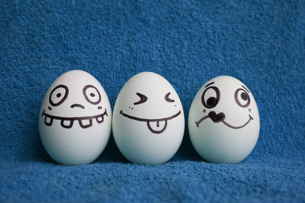 Eggs with faces photo for your design - 写真・画像