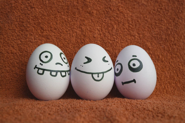 Eggs with faces photo for your design - 写真・画像