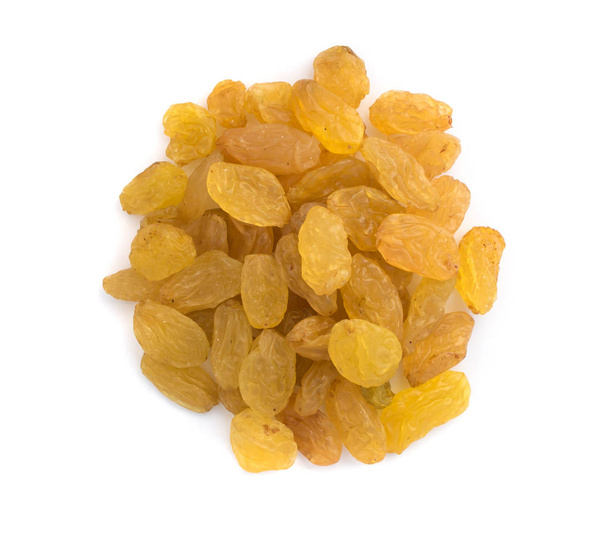tas de raisins secs jaunes sur fond blanc
 - Photo, image