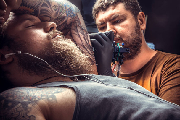 Szakmai tattooer, a munka-tetováló Studió - Fotó, kép