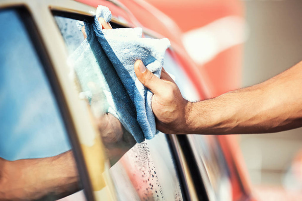 Man washing car - Fotó, kép