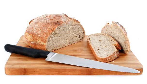 Loaf of bread and knife - Photo, Image