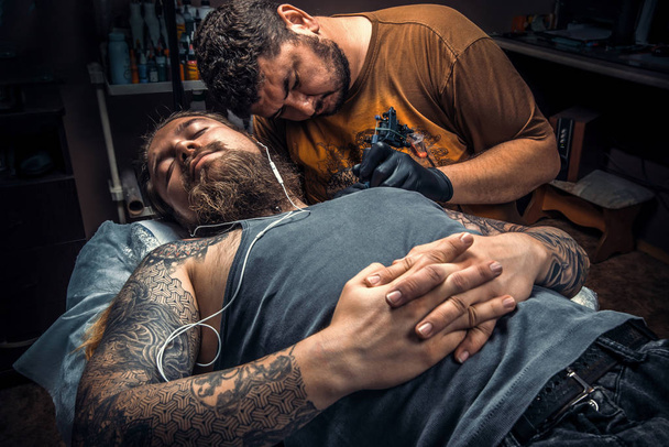 Tattoo tetováló szalon munkahelyi szakember - Fotó, kép