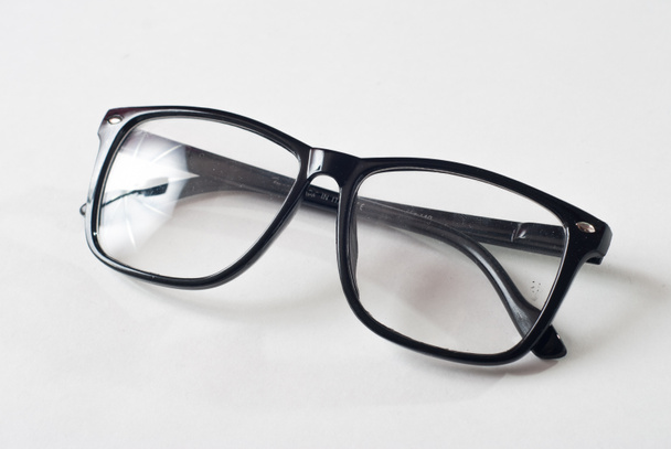 Fekete szemüveg fehér háttérrel, - Fotó, kép