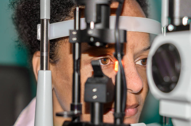 Young african woman at an optician - Photo, Image