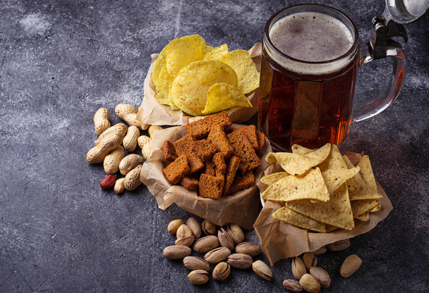 Beer and different snacks - Photo, Image