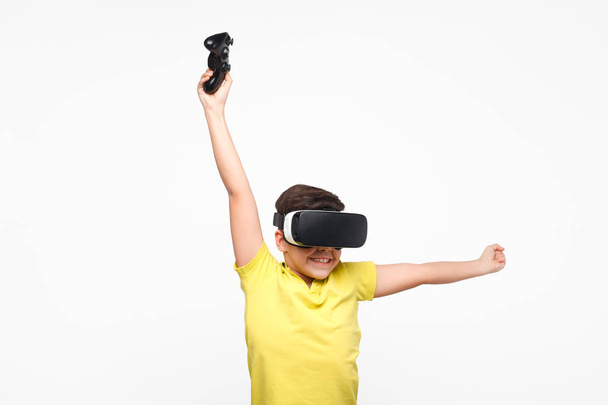 Boy wearing VR goggles - Zdjęcie, obraz
