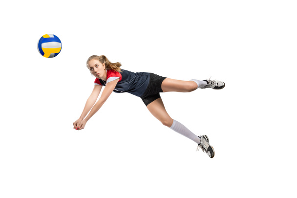 Female volleyball player hitting the ball - Photo, Image