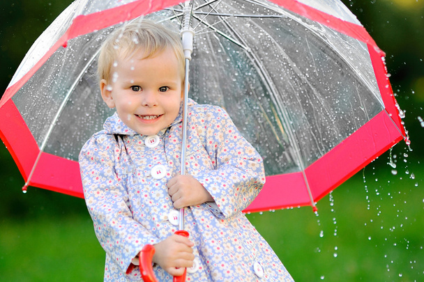 Portrait of a little girl with umbrella - Fotoğraf, Görsel