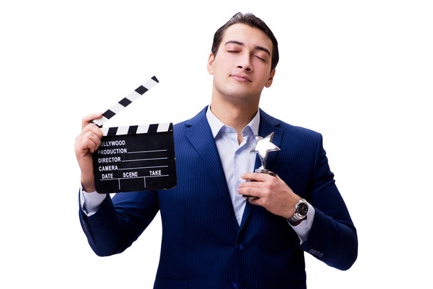 Handsome man with movie clapper isolated on white - Photo, Image