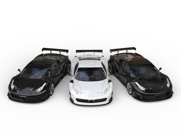 Fekete-fehér luxus sportkocsik egymás mellett - felülnézet - Fotó, kép