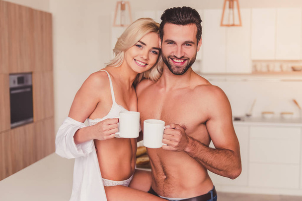 Couple in kitchen - Photo, Image