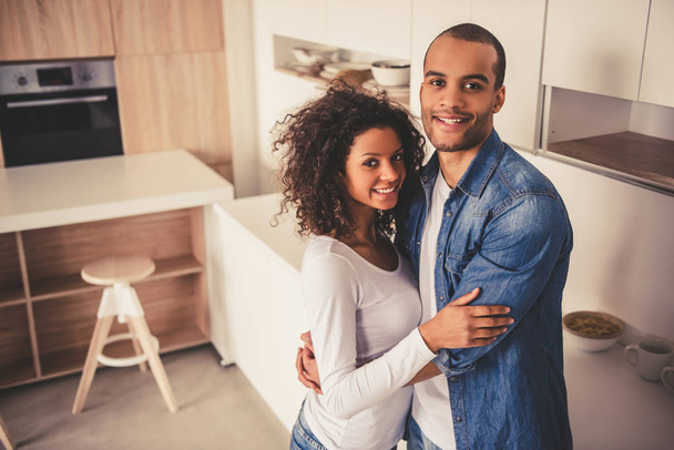 Afro American couple in kitchen - Foto, imagen