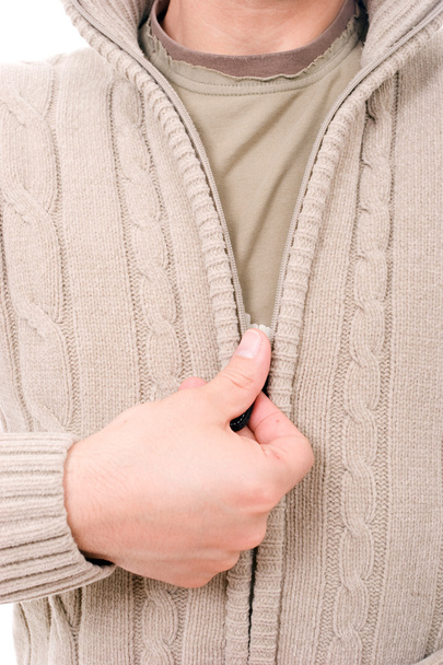 Людина одягання пальто
 - Фото, зображення