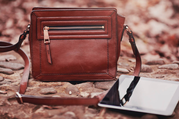 Deri çanta ve açık havada tablet - Fotoğraf, Görsel