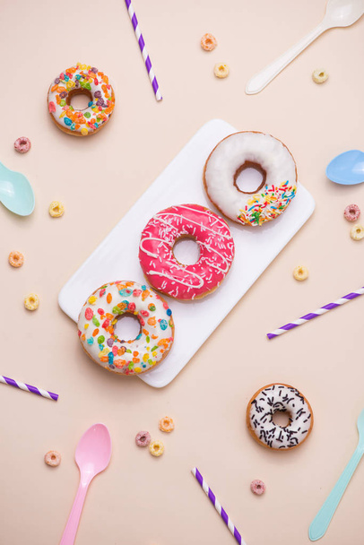 colourful donuts and bottles of drinks - Foto, Bild