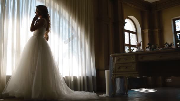Beautiful bride posing near decorated table - Footage, Video