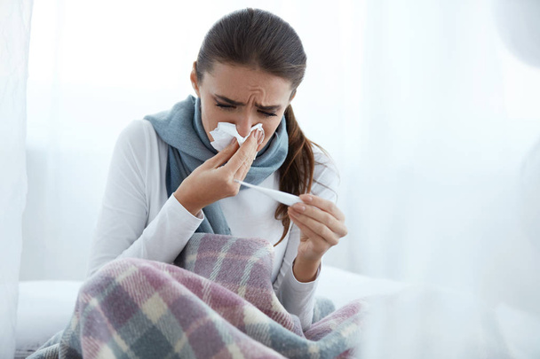 Woman Caught Cold Or Flu, Sneezing In Wipe And Wiping Nose - Фото, зображення
