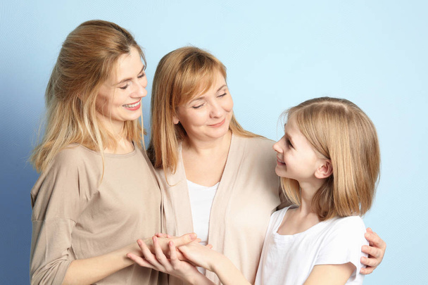 young woman with mother and daughter - Foto, Bild