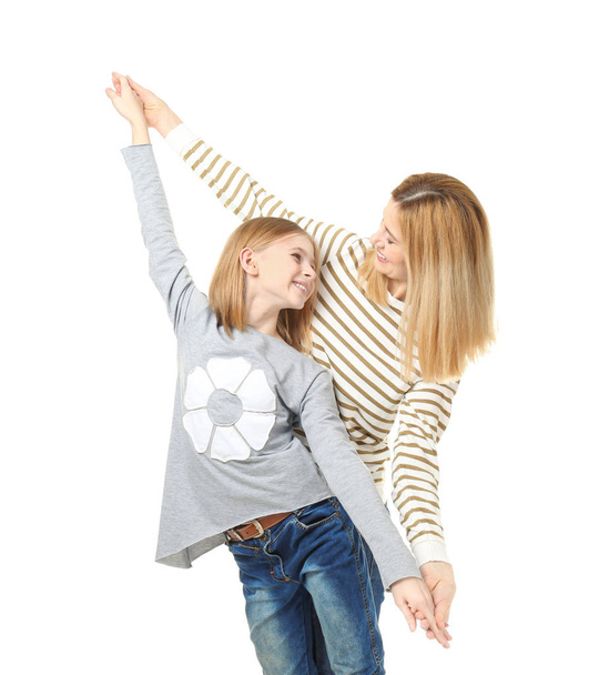 Happy mother and daughter on white background - Foto, imagen