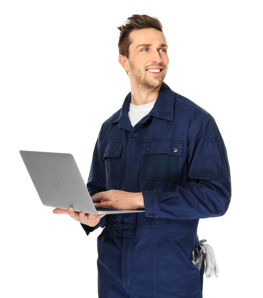 Handsome auto mechanic with laptop  - Foto, immagini
