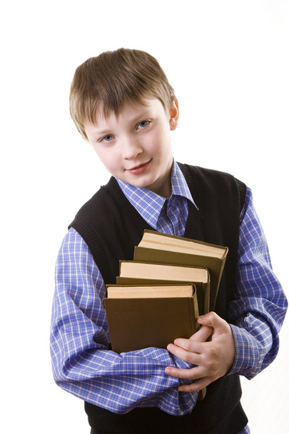 chłopiec z stos książek - Zdjęcie, obraz