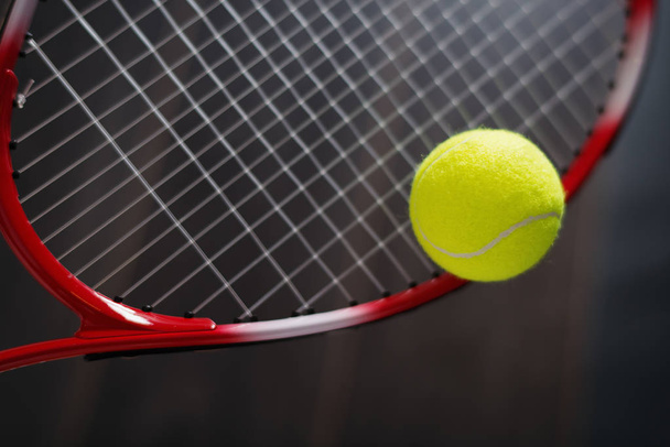 Tennis ball with rocket  - Foto, Imagen