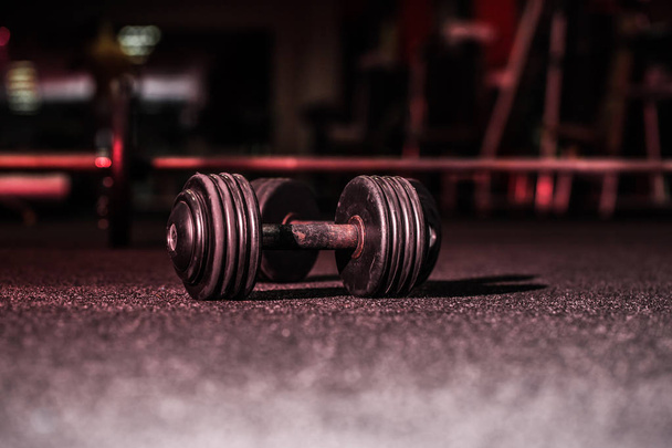 male dumbbells in the sports hall - 写真・画像