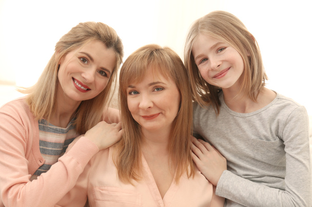 young woman with mother and daughter - Foto, Bild