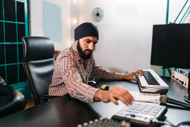 Sound producer in music studio - Фото, изображение