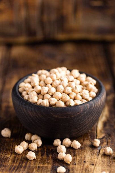 Chickpea on dark wooden rustic background - Photo, Image