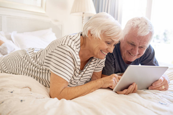 couple using  digital tablet - Fotó, kép