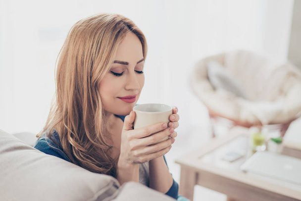 Young pretty cute woman enjoying coffee in the morning  - Photo, image