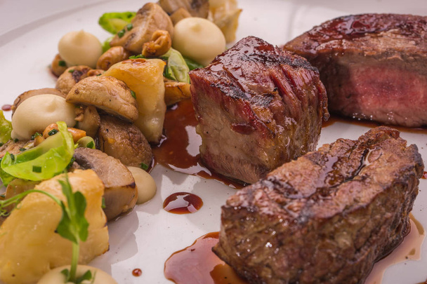 Beef fillets with sauce and mushrooms - 写真・画像