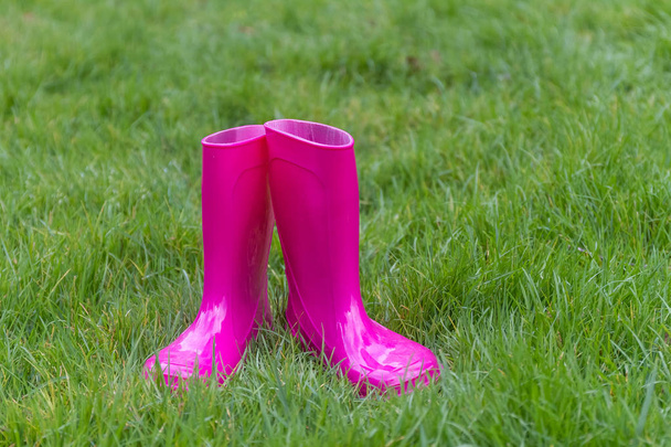 bright pink rubber boots  - Fotoğraf, Görsel