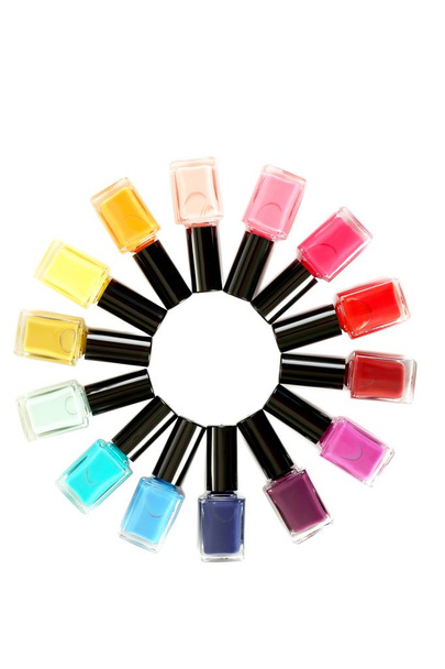 Bottles of nail polishes in shape of round - Foto, Imagen