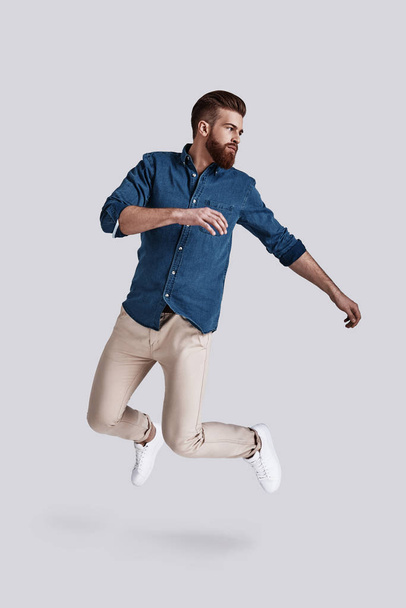 handsome stylish man jumping - Photo, image