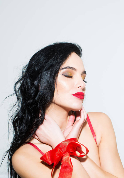 sexy woman with red lips, long hair in bra, ribbon - Valokuva, kuva