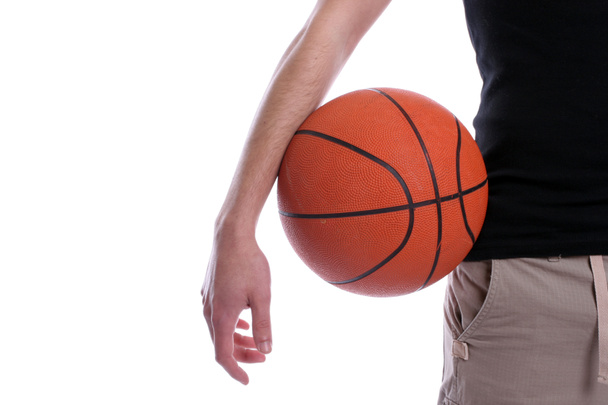 příležitostné muž, který držel míč na basketbal - Fotografie, Obrázek