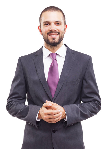 Portrait of a handsome business man smiling - 写真・画像