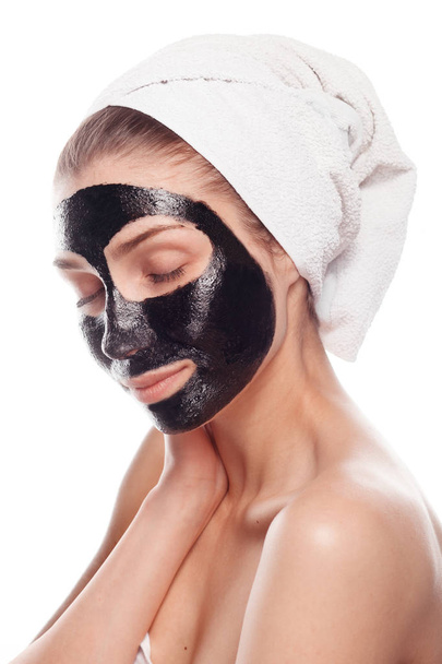 Young female with black mask - Foto, imagen