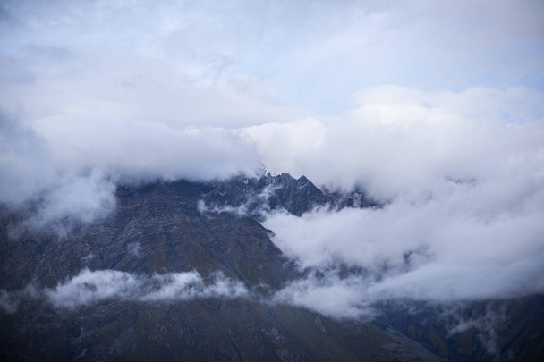 mount peak in a clouds - 写真・画像